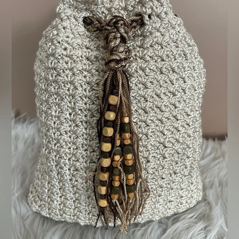 {The SAK} Crochet Drawstring Backpack Purse in Ivory